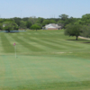 A view of a hole with water in background at Mill Creek Golf Club