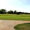 A sunny day view of a hole at Perry Country Club.