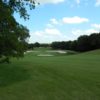 A view of a green protected by bunkers at Mill Creek Golf Club